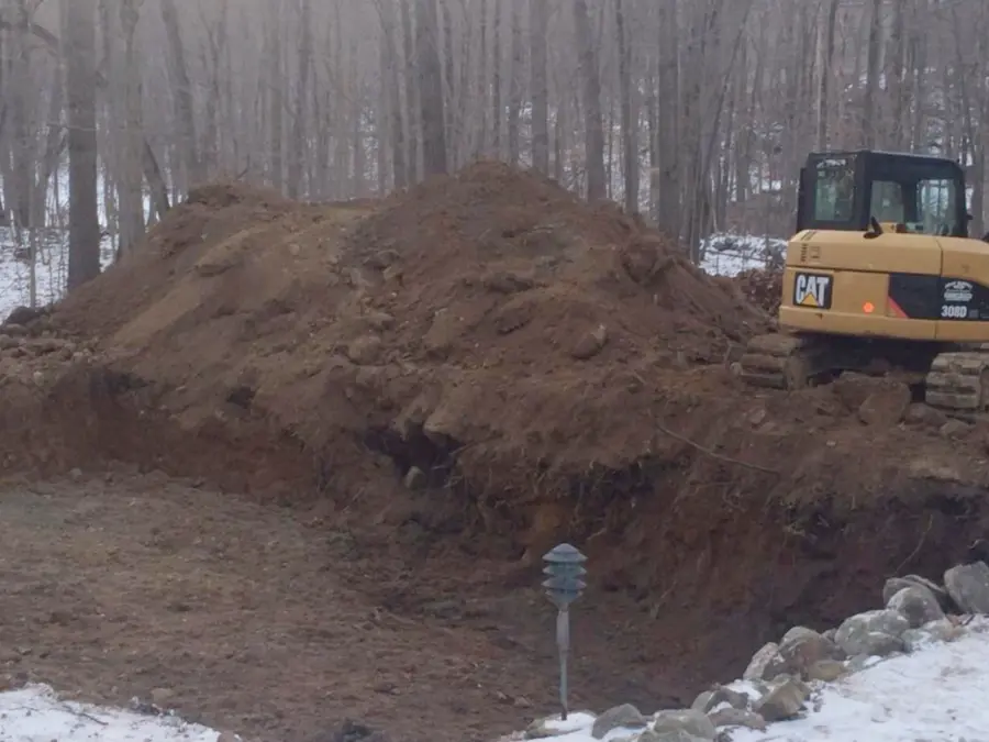 J. Cosentino excavator on a job site